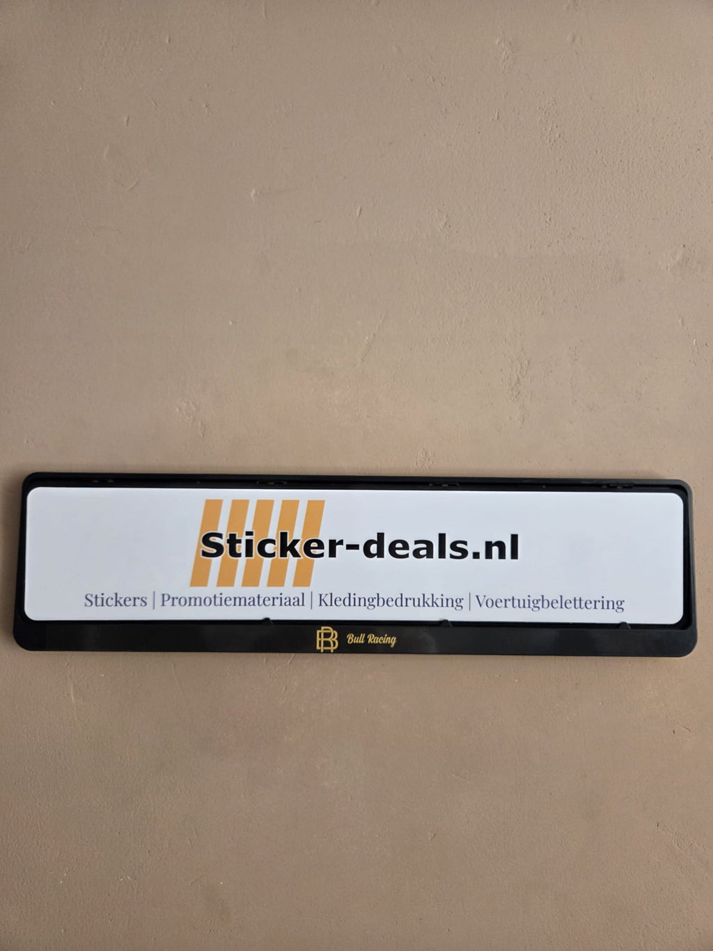 Kentekenplaatsticker met logo/tekst mét houder